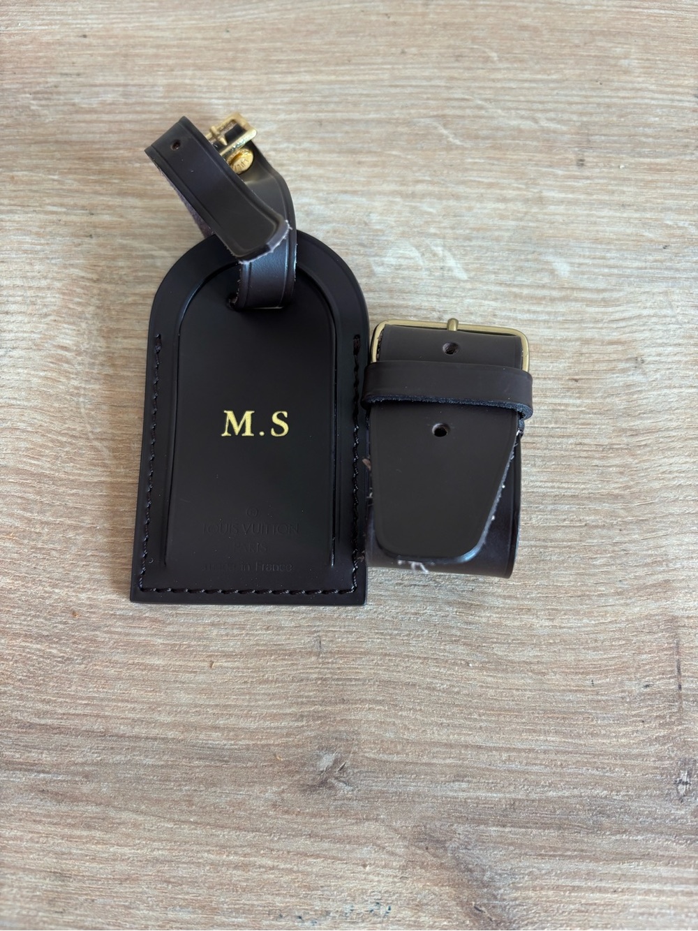 Authentic Louis Vuitton id tag and luggage strap